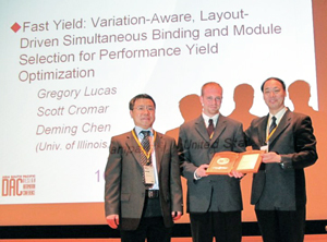 Dr. Kazutoshi Wakabayashi (right), the general chair of the IEEE/ACM Asia and South Pacific Design Automation Conference, presents the Best Paper Award to ECE Assistant Professor Deming Chen (left) and graduate student Greg Lucas. ECE graduate student Scott Cromar, who also co-authored the paper, was unable to attend the conference.